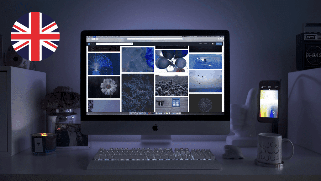 A 3D creative workstation illustration with a computer monitor and design icons, representing the benefits of hiring a local web design expert in Herefordshire.