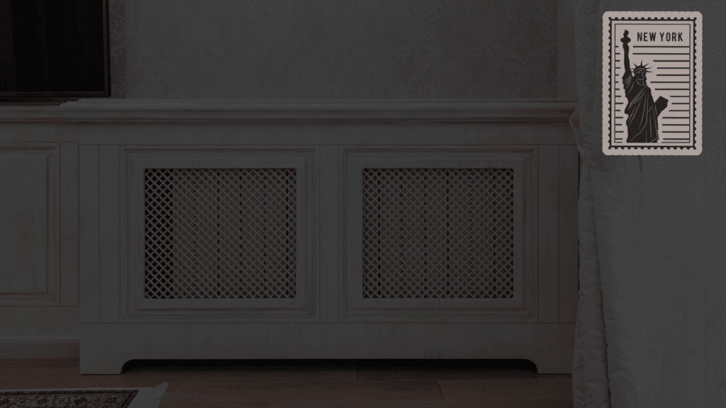 A pristine living room featuring a bespoke white wooden radiator enclosure styled as a functional window console shelf, highlighting premium Custom Made Radiator Covers for Beautiful New York Interiors.