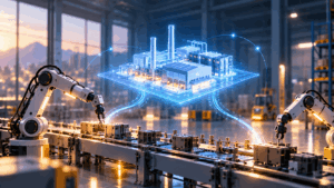 Robotic arms work on an assembly line beneath a blue holographic factory model in a modern manufacturing facility.